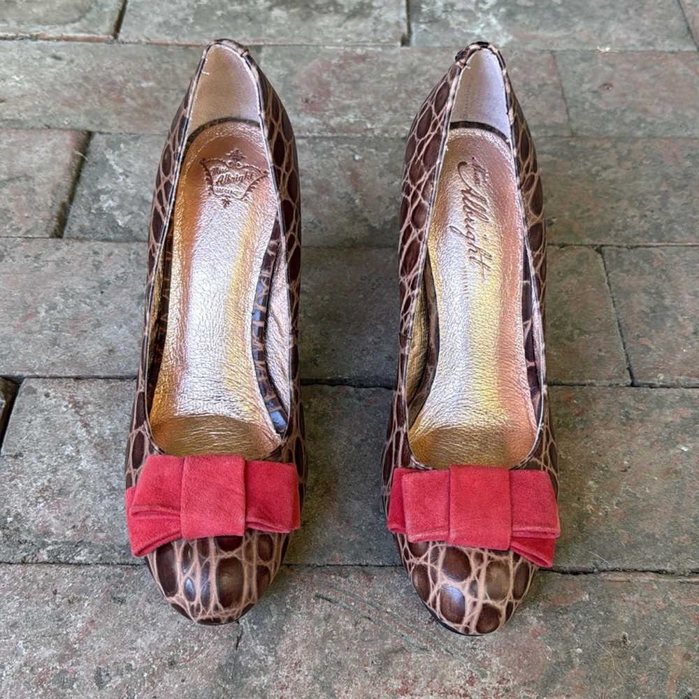 Miss Albright at Anthropologie "Darra" animal print bow pumps size 7M